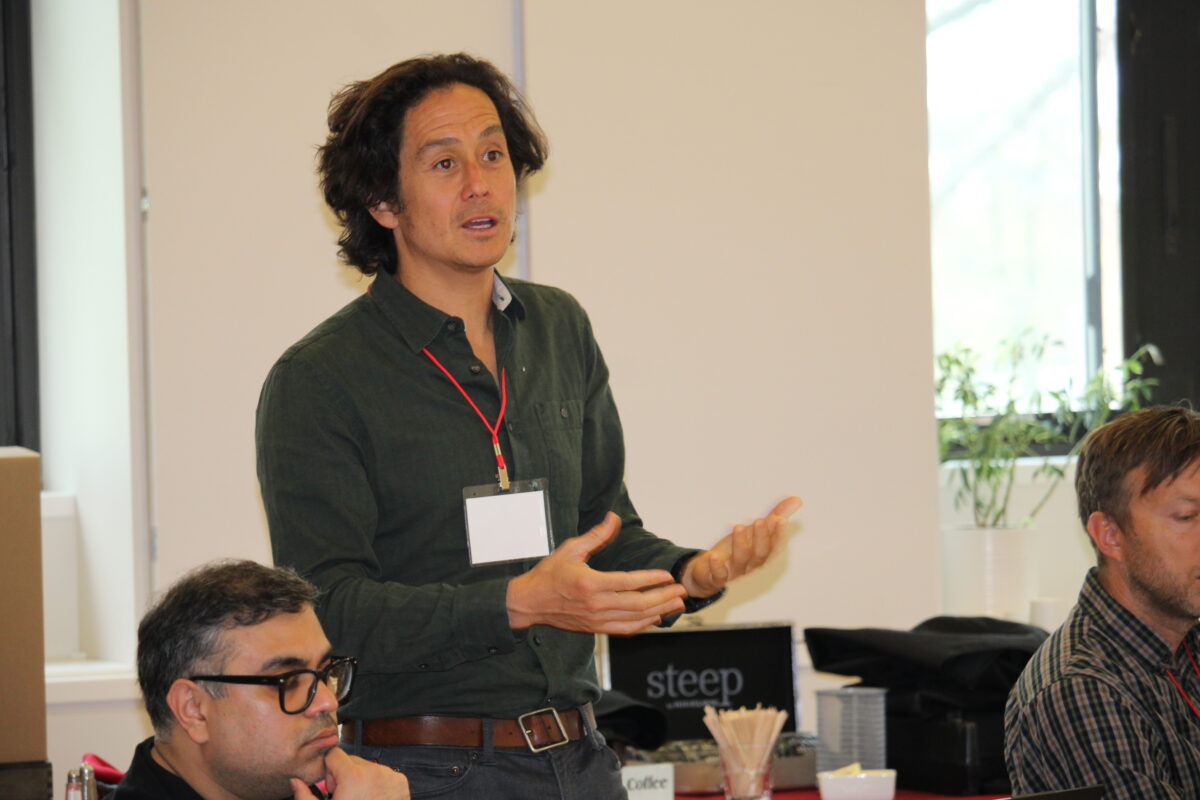 A color photo of a recent Thought Summit at Cornell University.