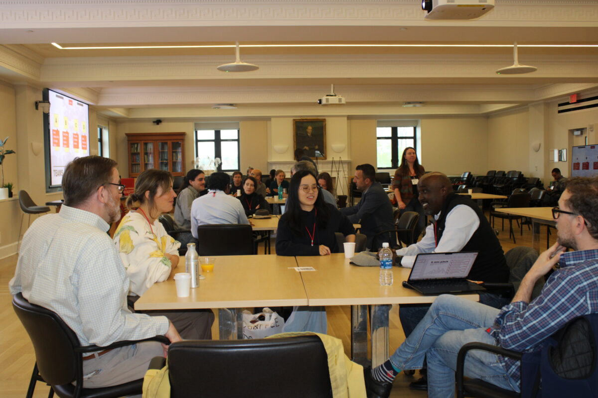 A color photo of a recent Thought Summit at Cornell University.