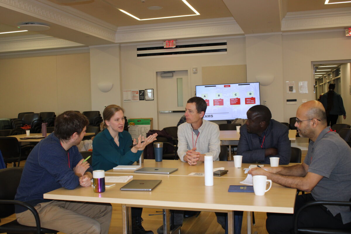 A color photo of a recent Thought Summit at Cornell University.